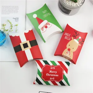 Details of Christmas pillow paper boxes, featuring cute Santa and reindeer prints for bakery gifts.