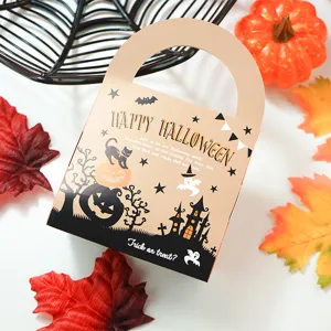Halloween candy packaging box close-up, decorative kraft paper treat bag for cookie and nougat.