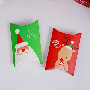 Festive Christmas pillow boxes for cookies and candy packaging featuring Santa and reindeer designs.
