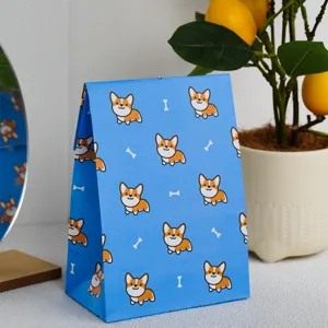 Χάρτινη τσάντα δώρου με χαριτωμένο corgi κινουμένων σχεδίων για καραμέλες και λεπτομέρειες.