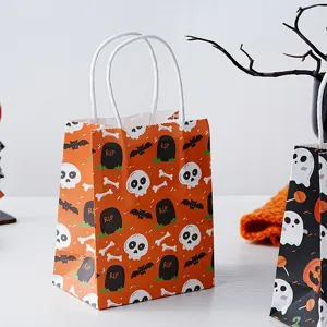 Halloween mini paper gift bag with spooky skull and tombstone print for party treats.