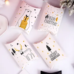 Christmas pillow gift paper boxes detail view showing cute holiday designs for packaging.