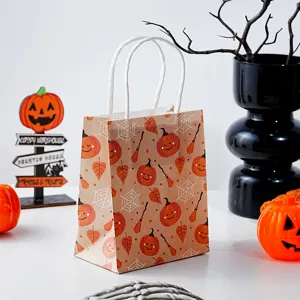 Halloween mini kraft paper gift bag with cute pumpkin pattern and sturdy handles for party.