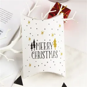 Christmas pillow gift box detail view, elegant gold and black holiday packaging paper box.