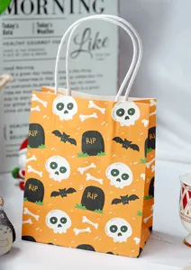 Mini Halloween paper gift bag with cute skull and tombstone print, perfect for party favors.