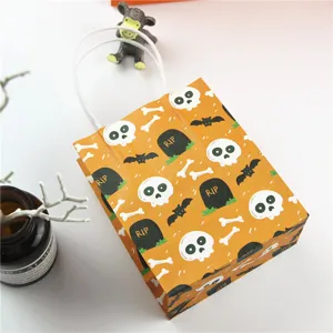 Mini Halloween paper gift bag with spooky skull and bone pattern, perfect for party favors.