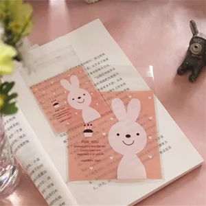 Cute self-adhesive candy bags with lovely rabbit pattern, perfect for baking gift packaging.