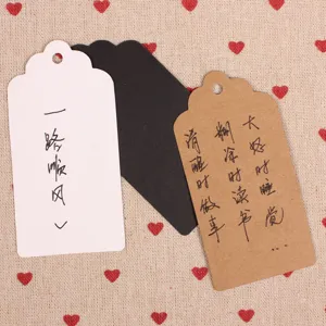 Blank kraft paper hanging tags with wavy top design, ideal for message cards, gift notes or baking labels.