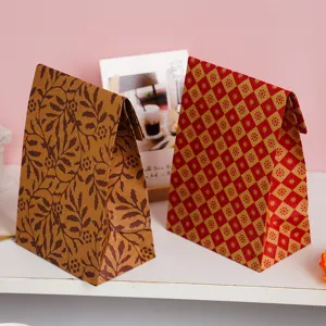 Retro leaf pattern and geometric gift paper bags, perfect for packaging retail items and gifts.