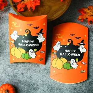 Halloween candy pillow box, cartoon pumpkin ghost gift packaging, festive decorative paper box detail.