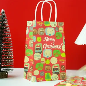 Bolsa de regalo de papel navideña con asa blanca, bolsa roja festiva para regalos de fiestas.