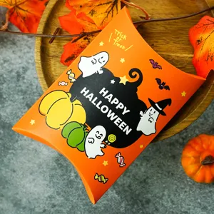 Detailed view of Halloween cartoon pumpkin ghost candy pillow box, creative gift packaging.