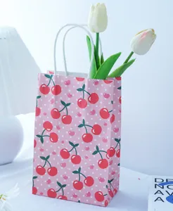 Piccola borsa regalo in carta con motivo ciliegie e pois rosa, graziosa borsa per dolci.