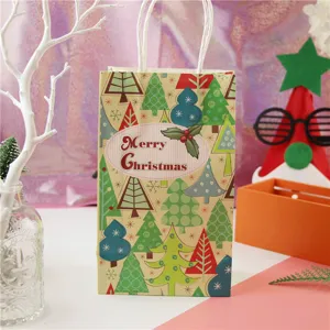 Christmas paper gift bag detail, tree pattern design, paper handle, for holiday gifts.