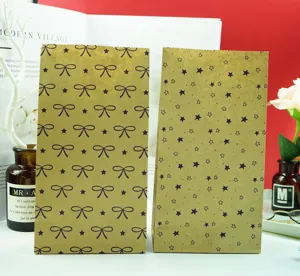 Bolsas de papel kraft para embalaje, bolsas de regalo para almacenamiento con lazos y estrellas.