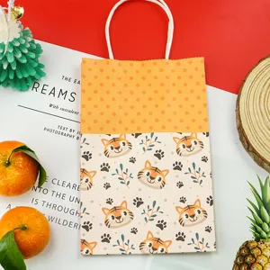 Borsa regalo in carta con tigre dei cartoni animati carina e manici per dolci bambini.