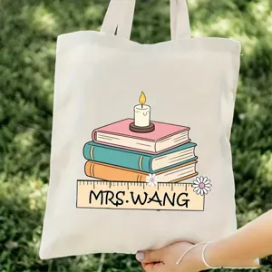 Vista detallada bolso de lona para profesores, diseño de libros y regla, bolso diario resistente.