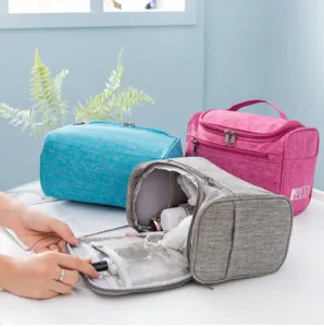 Portable travel toiletry bag with large capacity, multi-compartment design for daily use and travel.