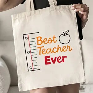 Detailansicht der Lehrertasche aus Canvas mit schönem Apfelaufdruck und tollem Spruch.