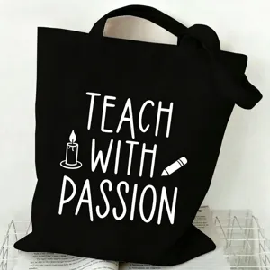 Detail view of a black canvas tote bag with teacher quote print, large capacity and durable.