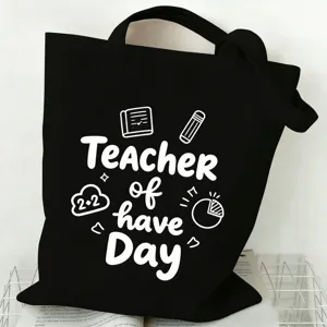 Black canvas tote bag with teacher graphic, large capacity casual shoulder bag for daily use.