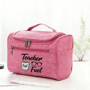 Pink portable cosmetic bag travel toiletry organizer for teachers with cute printed design.