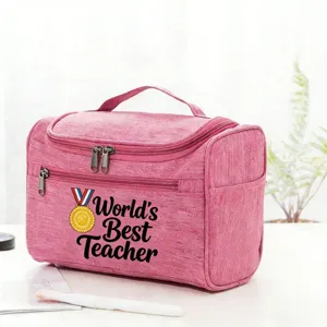 Pink travel cosmetic bag with teacher appreciation print, portable makeup organizer pouch.