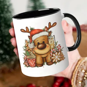 Christmas ceramic coffee mug with cute reindeer design, black handle and rim, festive gift cup.