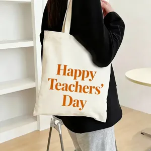 Canvas tote bag with Teacher's Day print, large capacity casual shoulder bag for students.