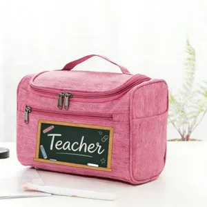 Pink travel cosmetic bag with teacher chalkboard print, portable storage organizer for makeup.