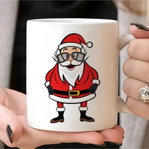 Detailed close-up view of the white ceramic coffee mug with a cool Santa Claus print.