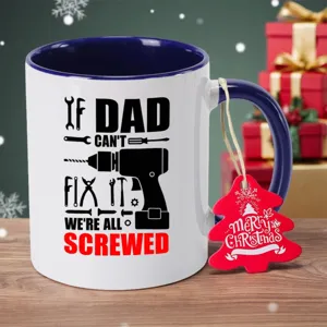 Ceramic coffee mug with funny dad fix quote and cute Christmas tree tag gift design.