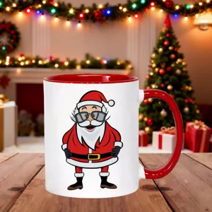 Christmas ceramic mug with funny Santa Claus graphic, festive red and white design detail