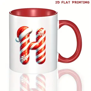 Bonita taza de café de cerámica con letra H estilo bastón de caramelo navideño rojo.