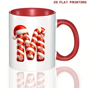 Taza de café de cerámica con letra M de bastón de caramelo navideño y asa roja