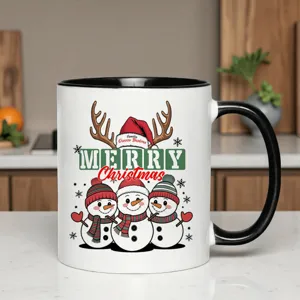 Detailed view of Christmas ceramic mug with cute snowman print, black and white design.