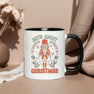 Christmas nutcracker ceramic coffee mug with black rim, festive holiday gift cup detail view.