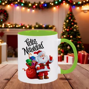 Festive Christmas ceramic coffee mug detail with green handle and cute Santa graphic.