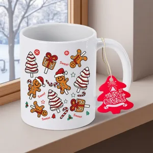 Christmas ceramic mug with cute gingerbread man pattern and festive hanging tag detail.