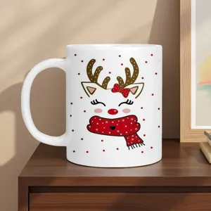 Close-up detail of white ceramic Christmas reindeer mug on wooden table. Festive gift cup.
