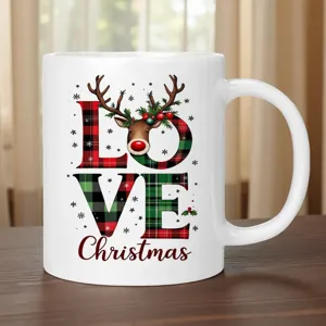 Close-up of a white ceramic Christmas coffee mug featuring red and green plaid LOVE design.