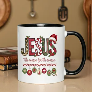Detailed view of the Christmas Jesus coffee mug with holiday print and cozy table setup.