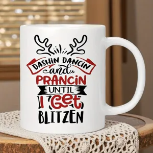 Christmas reindeer ceramic coffee mug detail, festive holiday hot drink cup with cute design.