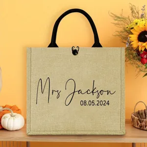 Personalized wedding burlap tote bag with custom name and date, ideal beach bag.