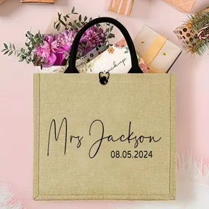 Personalized burlap tote bag with black handles, custom wedding beach bag for bride.