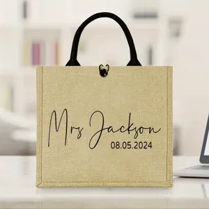 Detailed shot of personalized jute burlap tote bag with custom name print, ideal for beach.