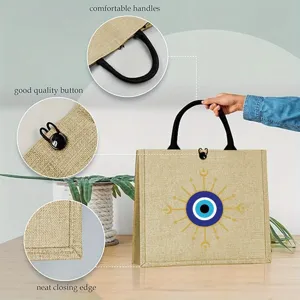 Close-up detail view of durable jute tote bag handles, button closure, and neat stitching.