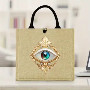 Gold baroque evil eye print linen tote bag, offering a unique mystical style for daily use.