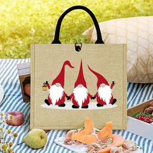 Sac cabas en jute avec joli design de gnomes de Noël mignons, idéal pour les cadeaux de fêtes.