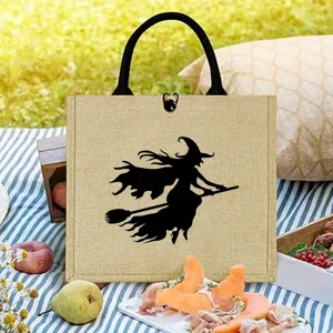 Large jute tote bag featuring witch silhouette, ideal for Halloween, travel and shopping.